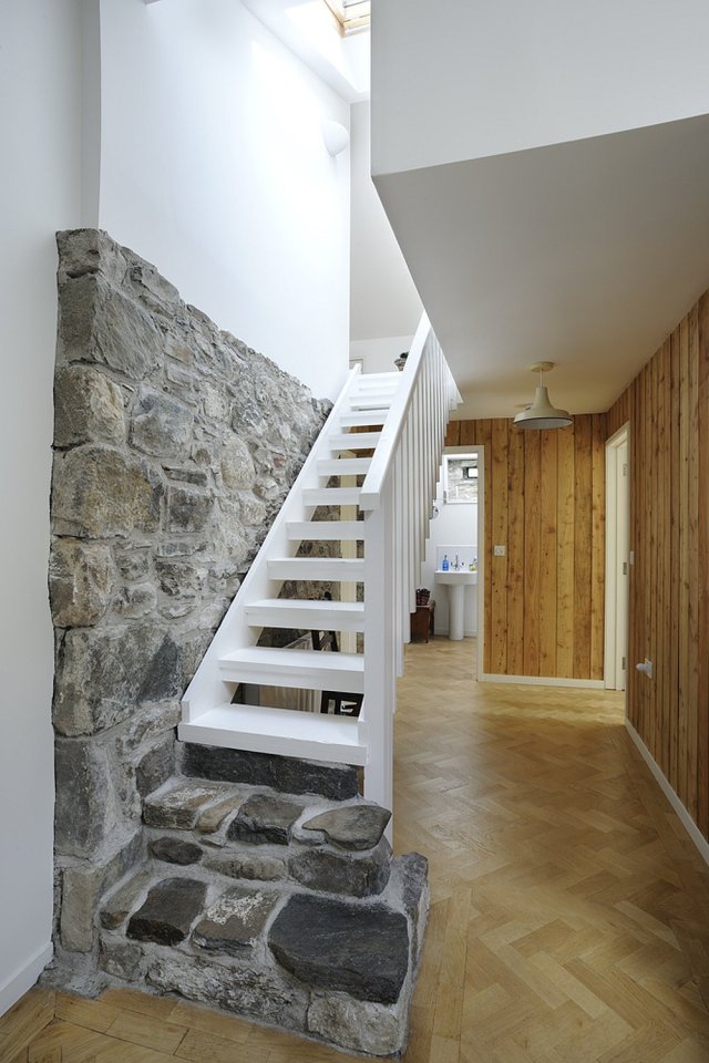An old stone horse barn in Scotland was converted into this small house with 1 bedroom and a large loft in 1,291 sq ft. | www.facebook.com/SmallHouseBliss