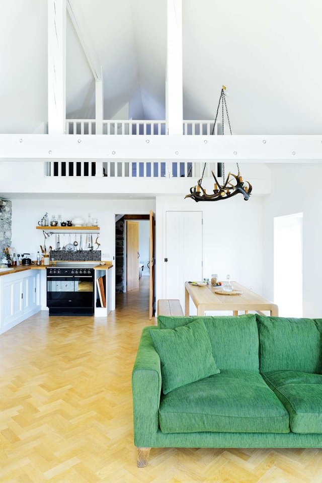 An old stone horse barn in Scotland was converted into this small house with 1 bedroom and a large loft in 1,291 sq ft. | www.facebook.com/SmallHouseBliss