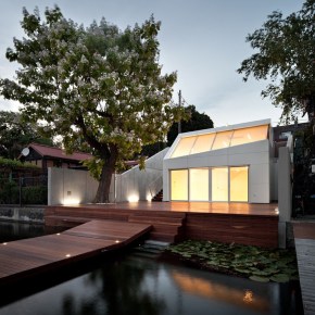 A "micro villa" inspired by luxury yachts. The studio dwelling has 484 sq ft of space, including the mezzanine loft. | www.facebook.com/SmallHouseBliss