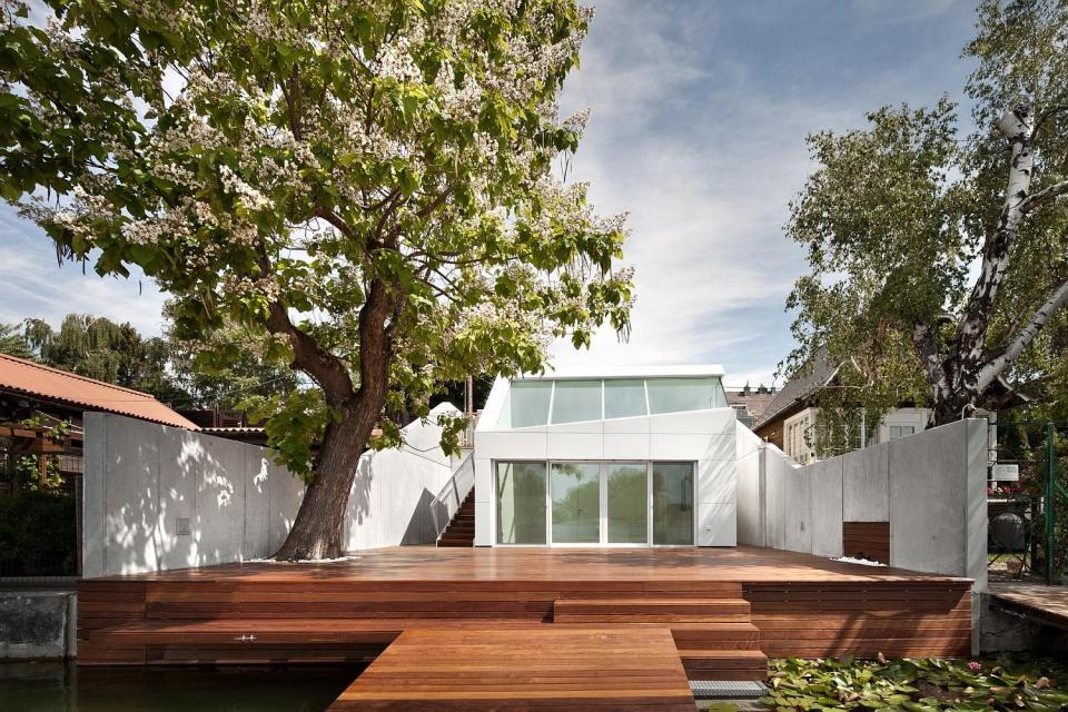 A "micro villa" inspired by luxury yachts. The studio dwelling has 484 sq ft of space, including the mezzanine loft. | www.facebook.com/SmallHouseBliss