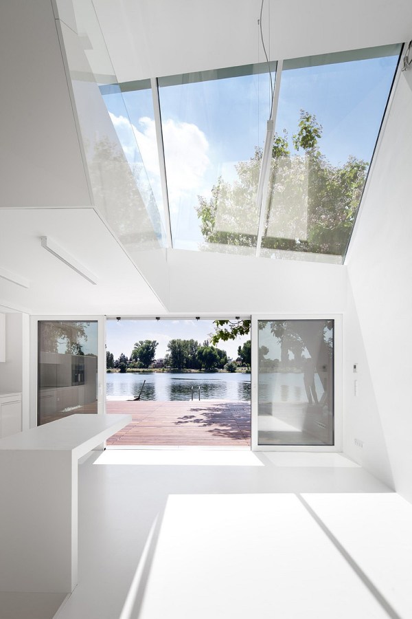 A "micro villa" inspired by luxury yachts. The studio dwelling has 484 sq ft of space, including the mezzanine loft. | www.facebook.com/SmallHouseBliss