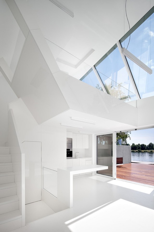 A "micro villa" inspired by luxury yachts. The studio dwelling has 484 sq ft of space, including the mezzanine loft. | www.facebook.com/SmallHouseBliss