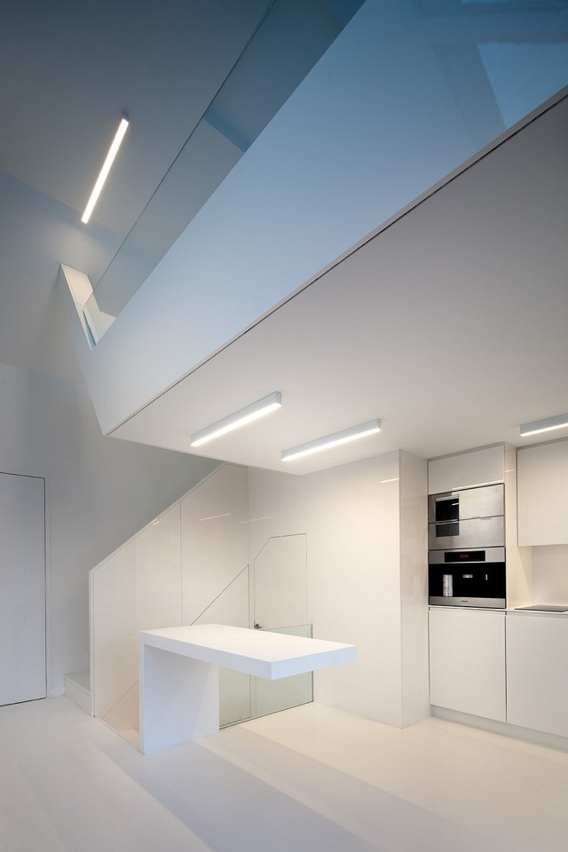 A "micro villa" inspired by luxury yachts. The studio dwelling has 484 sq ft of space, including the mezzanine loft. | www.facebook.com/SmallHouseBliss