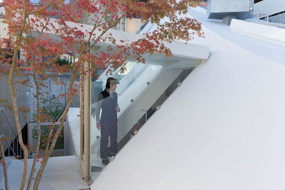 This sculptural swoosh of a house was architect Sou Fujimoto's solution to a tight urban site hemmed in by apartment buildings. | www.facebook.com/SmallHouseBliss