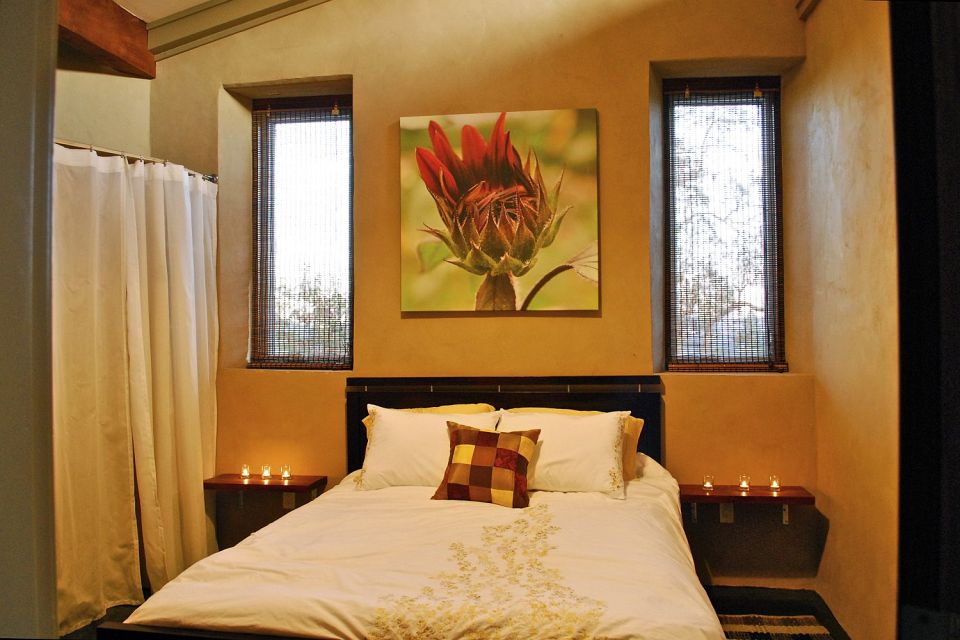 This off-grid and eco-friendly cob house has 2 bedrooms in 1,000 sq ft. | www.facebook.com/SmallHouseBliss