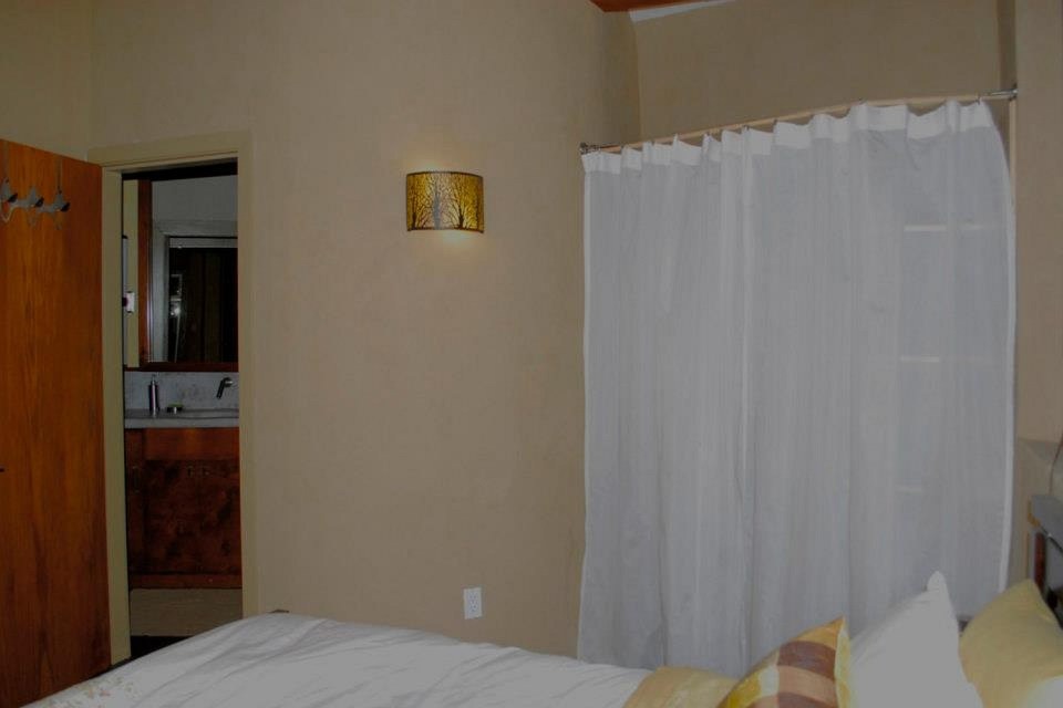 This off-grid and eco-friendly cob house has 2 bedrooms in 1,000 sq ft. | www.facebook.com/SmallHouseBliss