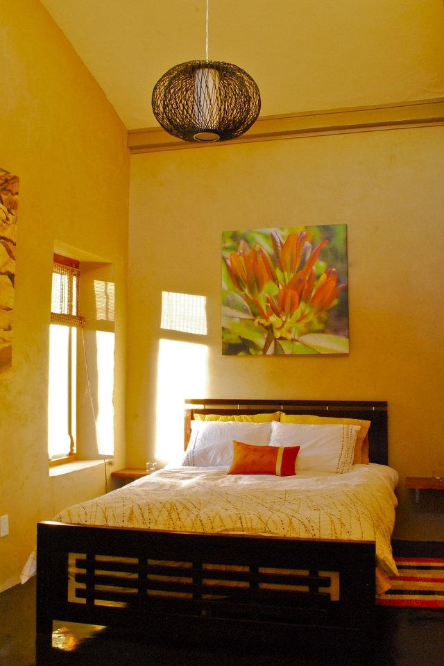 This off-grid and eco-friendly cob house has 2 bedrooms in 1,000 sq ft. | www.facebook.com/SmallHouseBliss