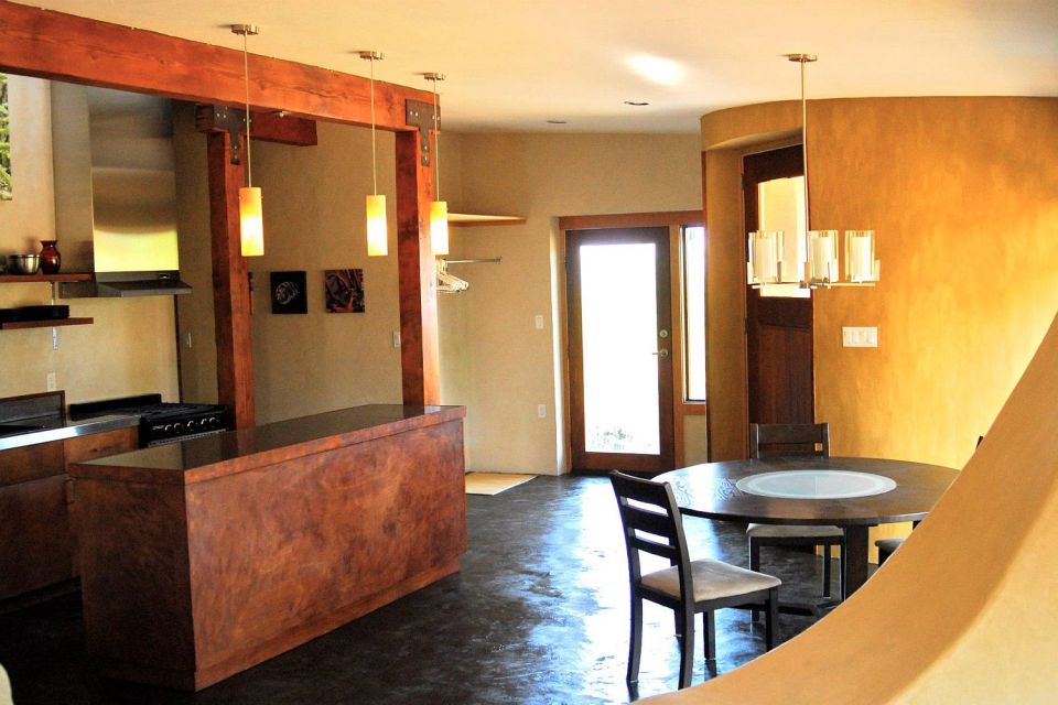 This off-grid and eco-friendly cob house has 2 bedrooms in 1,000 sq ft. | www.facebook.com/SmallHouseBliss