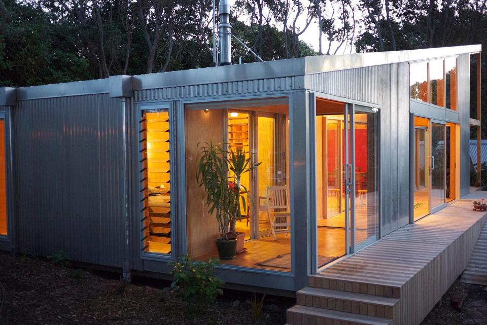 This "bach" (a simple, inexpensive vacation house) for a New Zealand family has 4 bedrooms in 1,507 sq ft. Designed by architects Bonnifait + Giesen, Atelierworkshop. | www.facebook.com/SmallHouseBliss