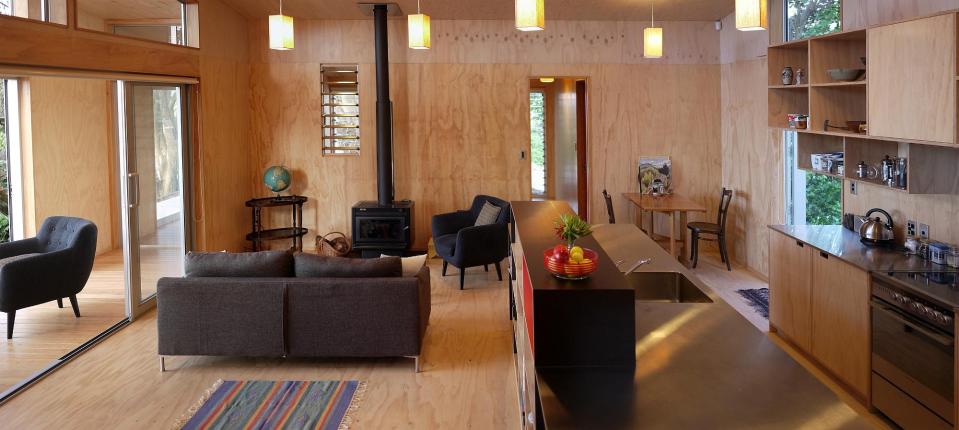 This "bach" (a simple, inexpensive vacation house) for a New Zealand family has 4 bedrooms in 1,507 sq ft. Designed by architects Bonnifait + Giesen, Atelierworkshop. | www.facebook.com/SmallHouseBliss