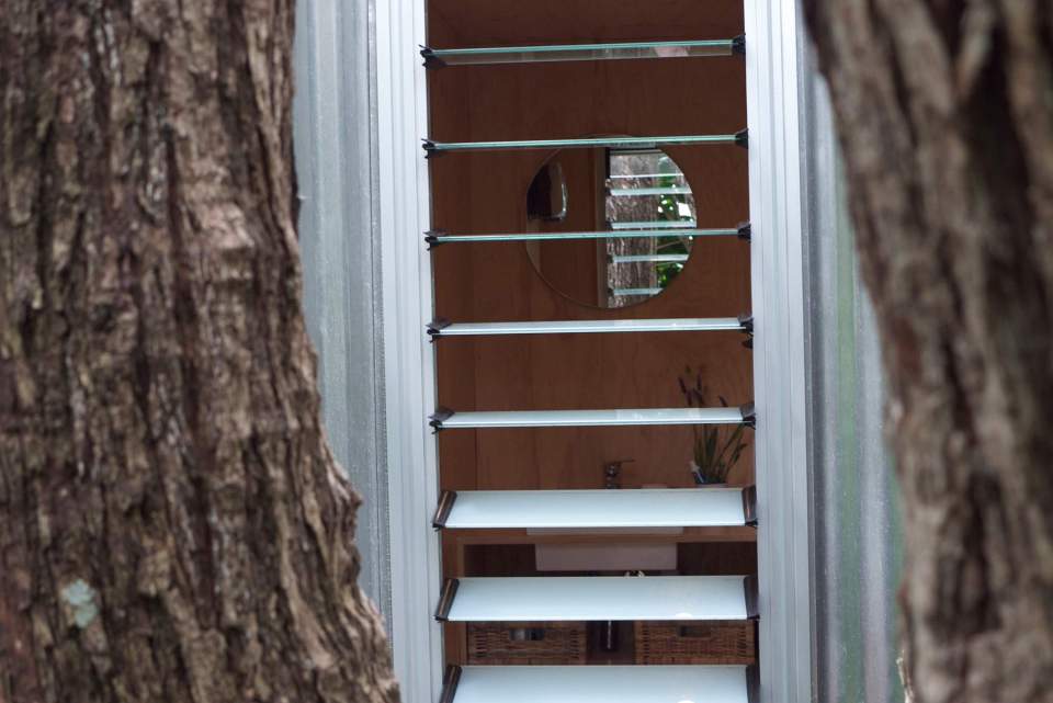 This "bach" (a simple, inexpensive vacation house) for a New Zealand family has 4 bedrooms in 1,507 sq ft. Designed by architects Bonnifait + Giesen, Atelierworkshop. | www.facebook.com/SmallHouseBliss