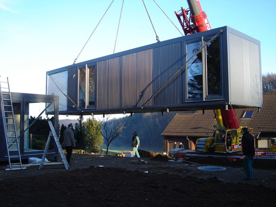 ContainerLove, a small house built from modules designed to resemble shipping containers. It has 2 bedrooms and room for a 3rd in about 969 sq ft. | www.facebook.com/SmallHouseBliss