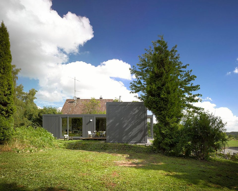 ContainerLove, a small house built from modules designed to resemble shipping containers. It has 2 bedrooms and room for a 3rd in about 969 sq ft. | www.facebook.com/SmallHouseBliss