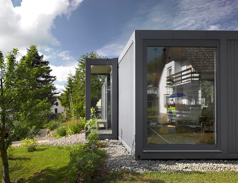 ContainerLove, a small house built from modules designed to resemble shipping containers. It has 2 bedrooms and room for a 3rd in about 969 sq ft. | www.facebook.com/SmallHouseBliss