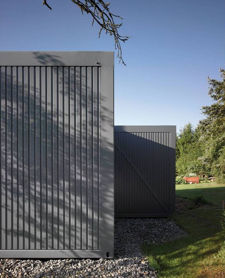 ContainerLove, a small house built from modules designed to resemble shipping containers. It has 2 bedrooms and room for a 3rd in about 969 sq ft. | www.facebook.com/SmallHouseBliss