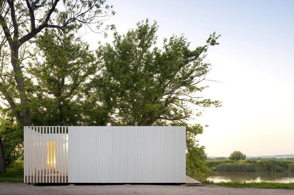 Treehouse Riga, a compact modular home with 2 bedrooms in just 474 sq ft. A sliding wall gives it a flexible floor plan. | www.facebook.com/SmallHouseBliss