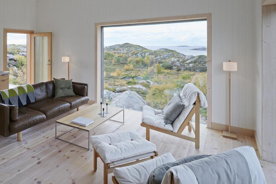 This family vacation cottage on a remote Norwegian island was modeled on traditional boat sheds. It has 3 bedrooms in 1,507 sq ft. | www.facebook.com/SmallHouseBliss