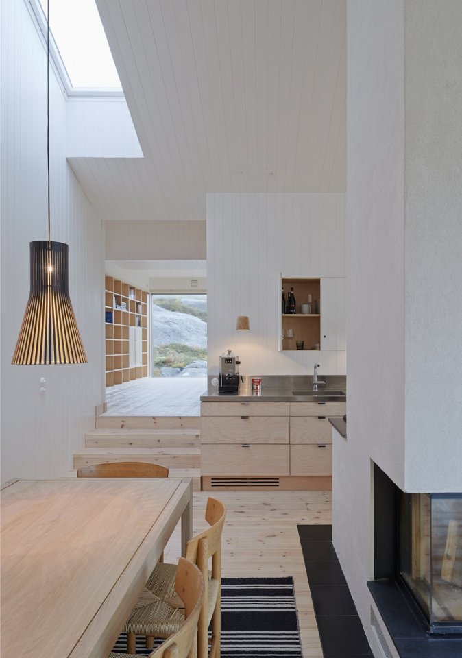 This family vacation cottage on a remote Norwegian island was modeled on traditional boat sheds. It has 3 bedrooms in 1,507 sq ft. | www.facebook.com/SmallHouseBliss