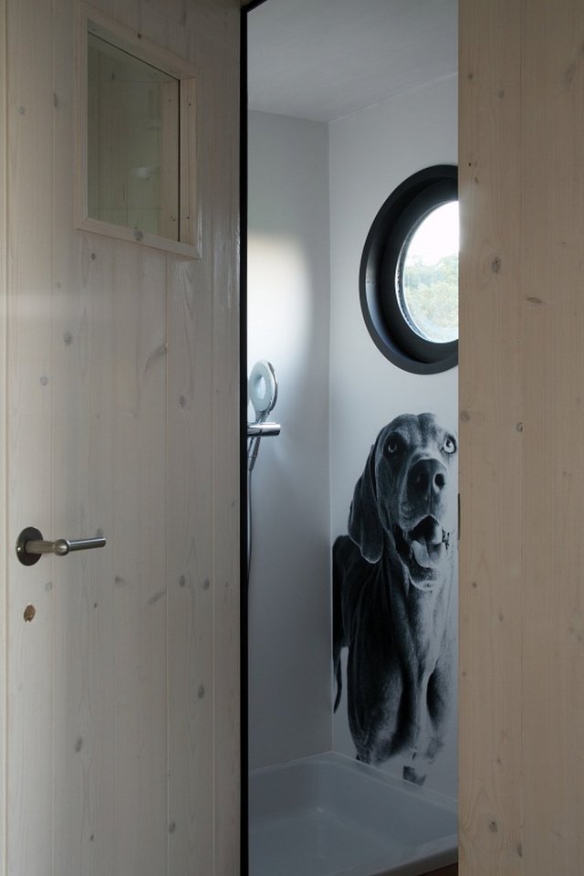 A modern version of the traditional wagon dwelling. It has a full kitchen, 3-piece bath and built-in bed in 258 sq ft. | www.facebook.com/SmallHouseBliss