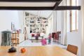 A dingy workshop in Paris was transformed into this bright and airy home with a glass-enclosed loft. | www.facebook.com/SmallHouseBliss