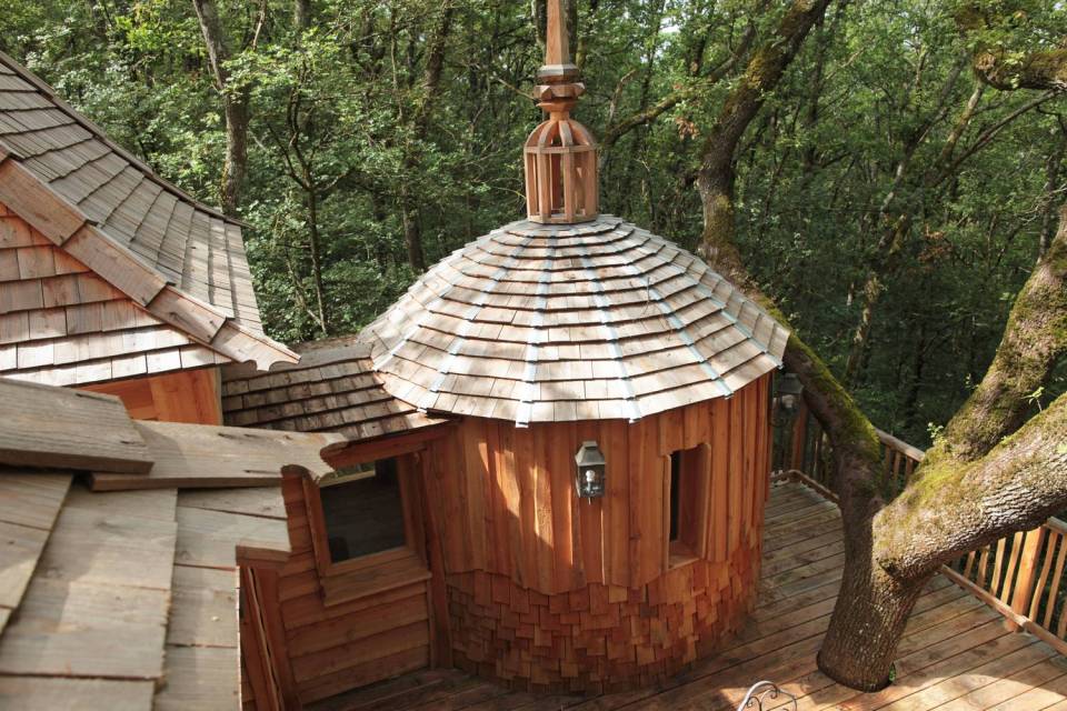 Cabane Hautefort at Châteaux Dans Les Arbres is a luxury treehouse with 3 bedrooms and a full kitchen and bath in 603 sq ft. | www.facebook.com/SmallHouseBliss