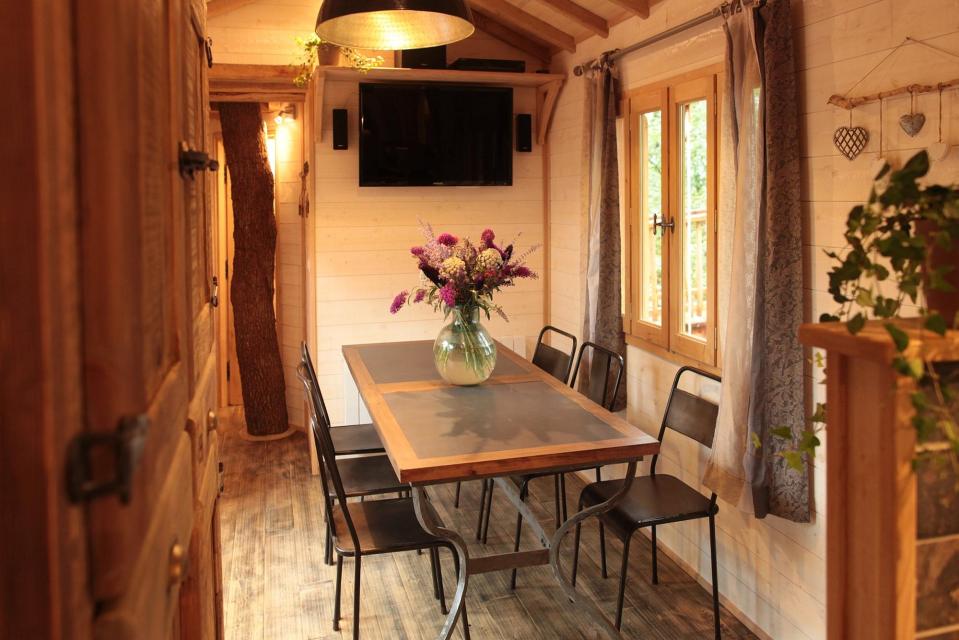Cabane Hautefort at Châteaux Dans Les Arbres is a luxury treehouse with 3 bedrooms and a full kitchen and bath in 603 sq ft. | www.facebook.com/SmallHouseBliss