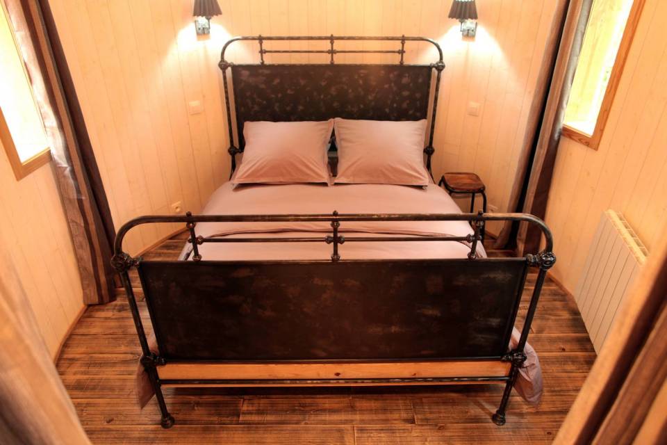 Cabane Hautefort at Châteaux Dans Les Arbres is a luxury treehouse with 3 bedrooms and a full kitchen and bath in 603 sq ft. | www.facebook.com/SmallHouseBliss