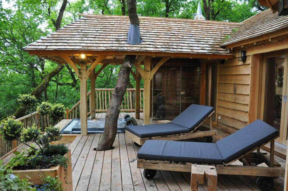 Cabane Puybéton at Châteaux Dans Les Arbres is a luxury treehouse with 1 bedroom, fireplace, spa bath and sauna. | www.facebook.com/SmallHouseBliss