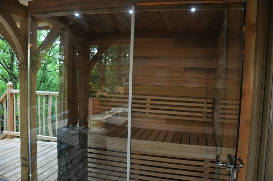 Cabane Puybéton at Châteaux Dans Les Arbres is a luxury treehouse with 1 bedroom, fireplace, spa bath and sauna. | www.facebook.com/SmallHouseBliss