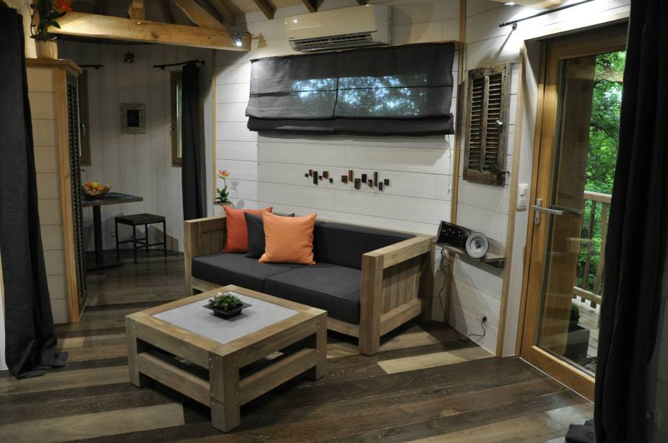 Cabane Puybéton at Châteaux Dans Les Arbres is a luxury treehouse with 1 bedroom, fireplace, spa bath and sauna. | www.facebook.com/SmallHouseBliss
