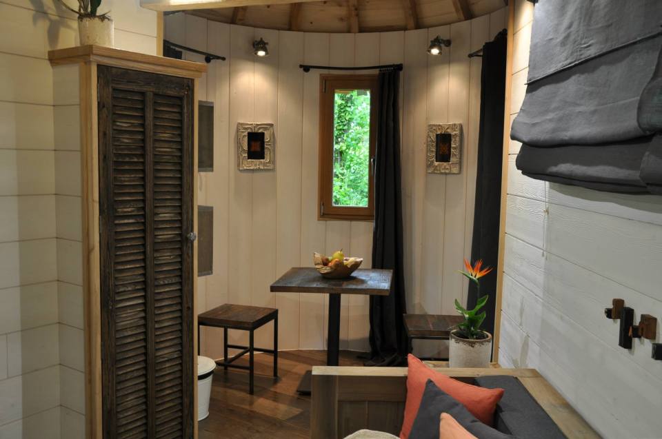Cabane Puybéton at Châteaux Dans Les Arbres is a luxury treehouse with 1 bedroom, fireplace, spa bath and sauna. | www.facebook.com/SmallHouseBliss