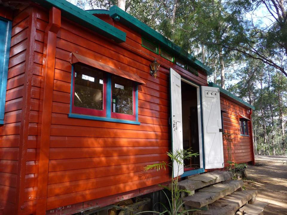 Matthew de Boer restored a derelict train carriage, handcrafting a beautiful and cozy living space with 1 bedroom in ~256 sq ft. | www.facebook.com/SmallHouseBliss