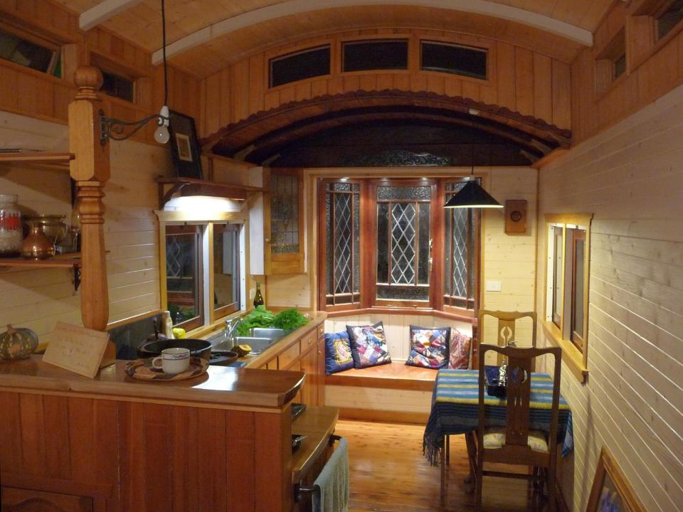 Matthew de Boer restored a derelict train carriage, handcrafting a beautiful and cozy living space with 1 bedroom in ~256 sq ft. | www.facebook.com/SmallHouseBliss