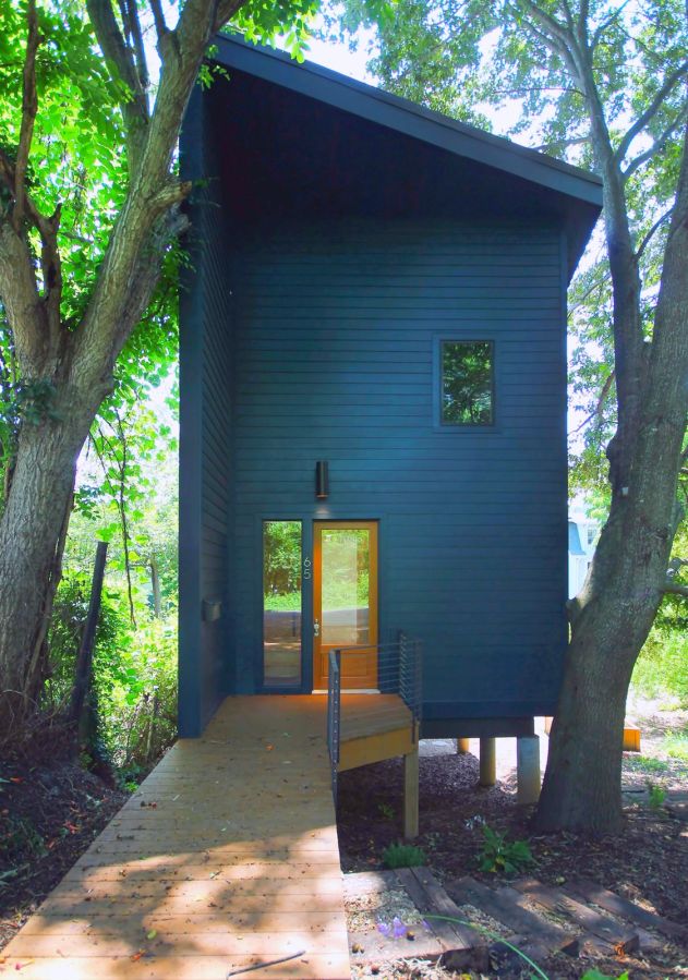 The compact and affordable home has 1 bedroom and a loft in 950 sq ft. | www.facebook.com/SmallHouseBliss