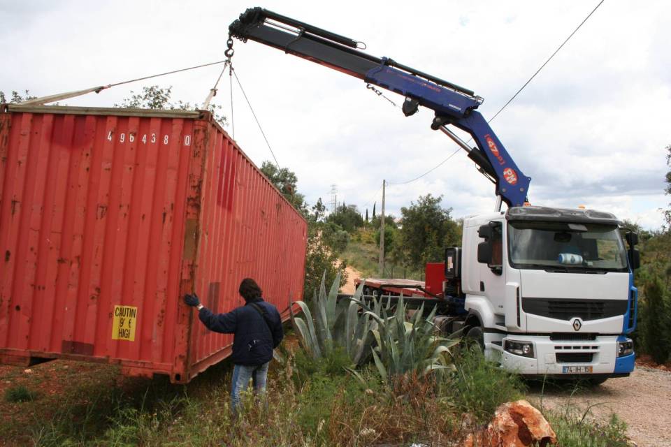 Nomad Living, a shipping container guest house that expands out to a shaded terrace. | www.facebook.com/SmallHouseBliss