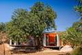 Nomad Living, a shipping container guest house that expands out to a shaded terrace. | www.facebook.com/SmallHouseBliss