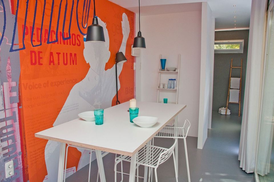 Nomad Living, a shipping container guest house that expands out to a shaded terrace. | www.facebook.com/SmallHouseBliss