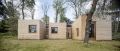 A passive house in Spain composed of six prefabricated wood boxes. It has 3 bedrooms in 1,195 sq ft. | www.facebook.com/SmallHouseBliss