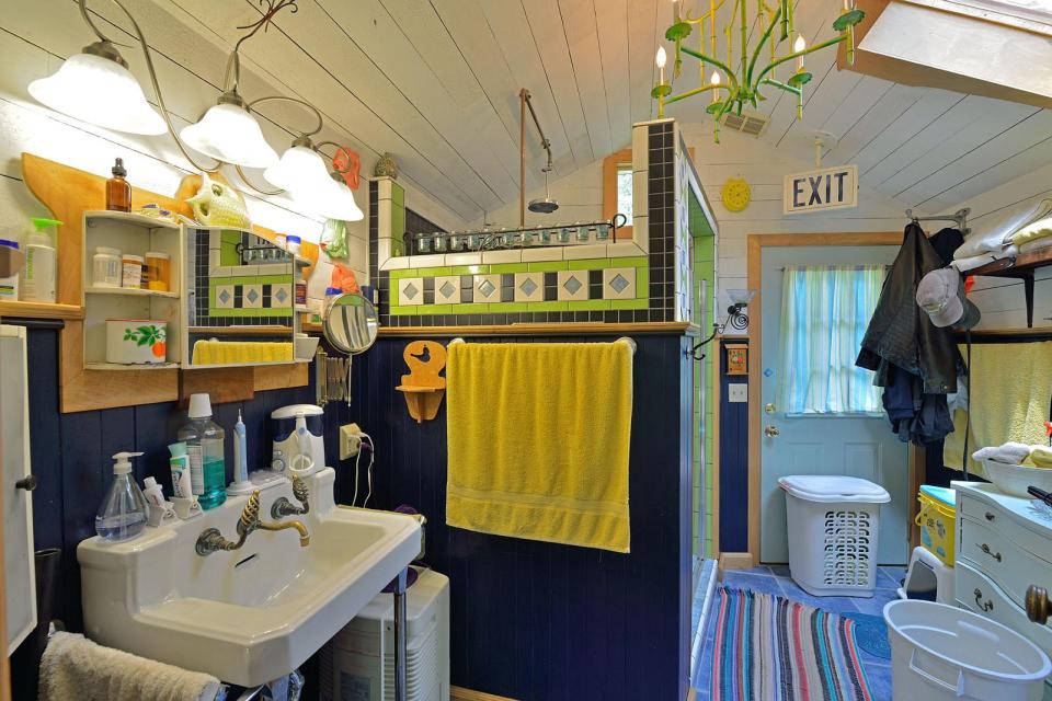 This tiny storybook cottage was handcrafted by its owner. It has 1 bedroom in 520 sq ft. | www.facebook.com/SmallHouseBliss