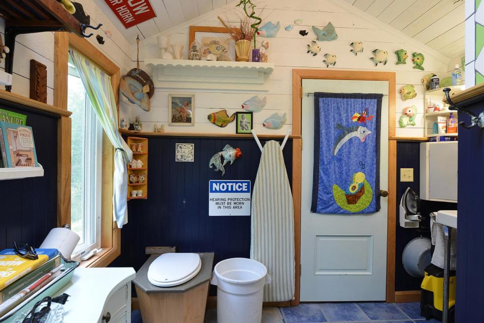 This tiny storybook cottage was handcrafted by its owner. It has 1 bedroom in 520 sq ft. | www.facebook.com/SmallHouseBliss