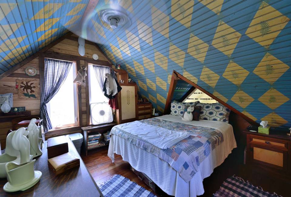 This tiny storybook cottage was handcrafted by its owner. It has 1 bedroom in 520 sq ft. | www.facebook.com/SmallHouseBliss