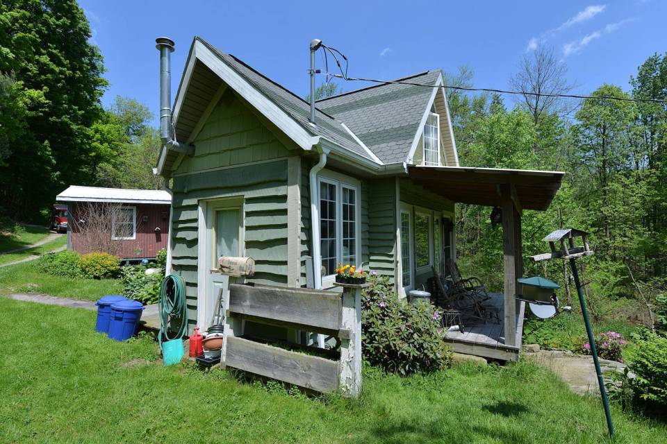 This tiny storybook cottage was handcrafted by its owner. It has 1 bedroom in 520 sq ft. | www.facebook.com/SmallHouseBliss