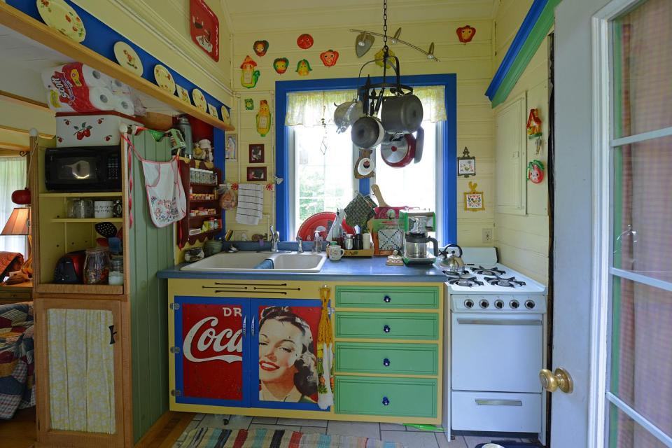 This tiny storybook cottage was handcrafted by its owner. It has 1 bedroom in 520 sq ft. | www.facebook.com/SmallHouseBliss