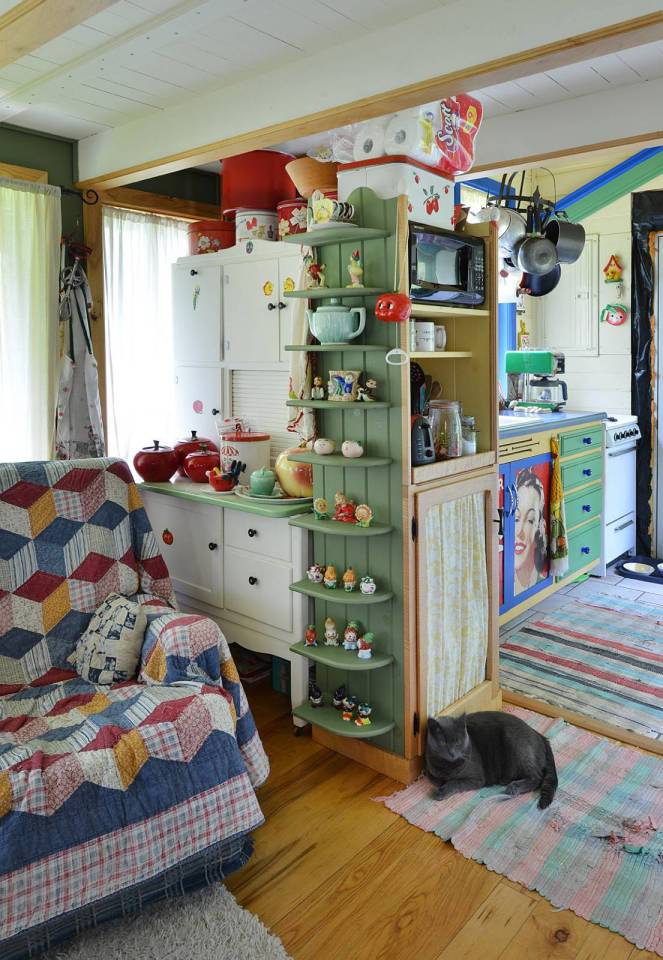 This tiny storybook cottage was handcrafted by its owner. It has 1 bedroom in 520 sq ft. | www.facebook.com/SmallHouseBliss