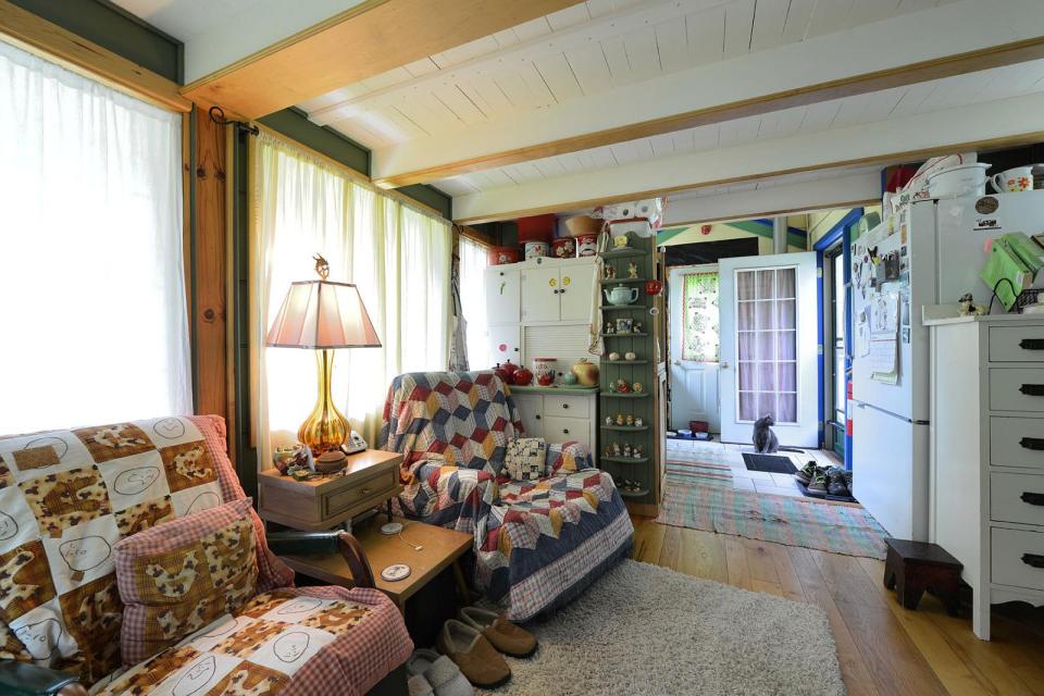 This tiny storybook cottage was handcrafted by its owner. It has 1 bedroom in 520 sq ft. | www.facebook.com/SmallHouseBliss
