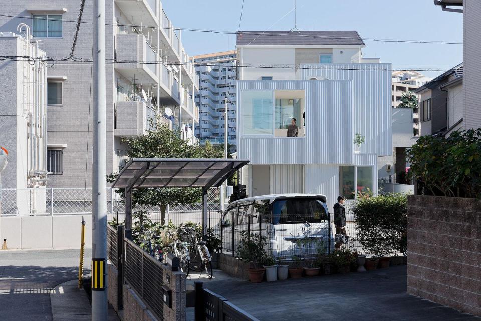 Boxy on the outside but extremely open on the inside, this small family house has 3 open bedrooms in 964 sq ft. | www.facebook.com/SmallHouseBliss