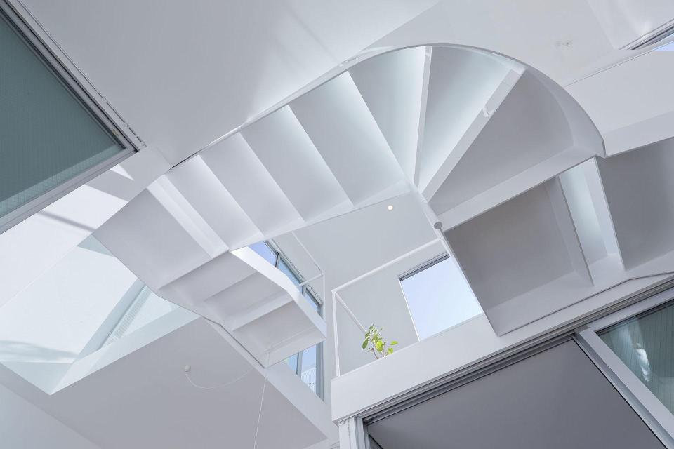 Boxy on the outside but extremely open on the inside, this small family house has 3 open bedrooms in 964 sq ft. | www.facebook.com/SmallHouseBliss