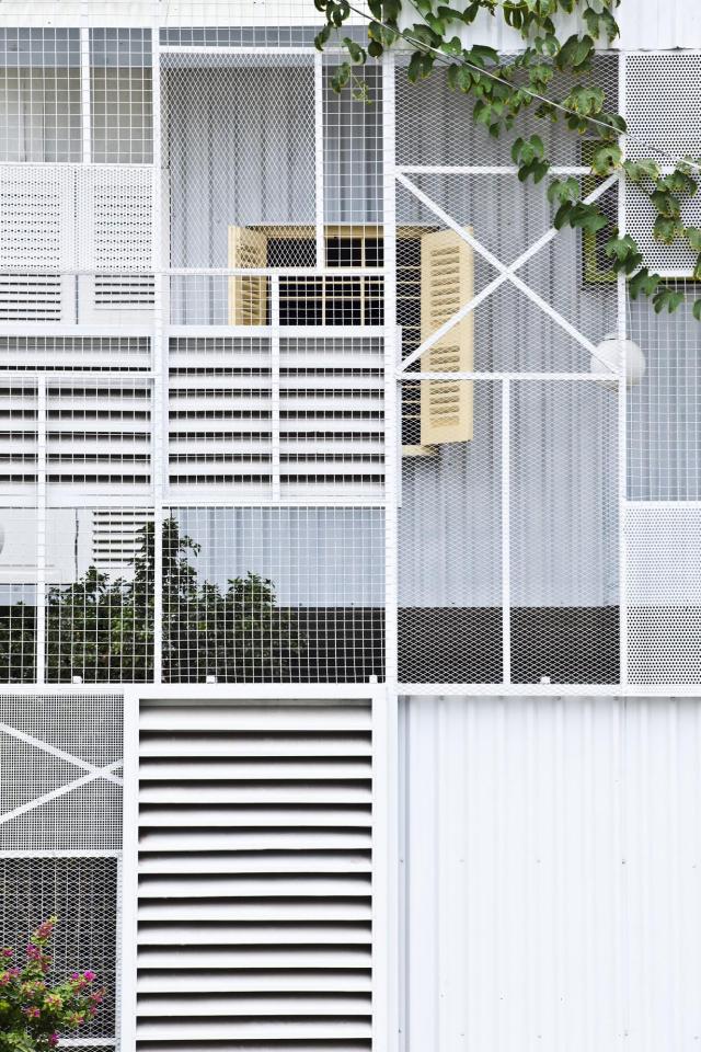 This small house in Vietnam has its ground floor living space open to the outdoors. It will eventually be covered by a screen of climbing plants. | www.facebook.com/SmallHouseBliss