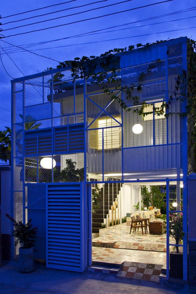 This small house in Vietnam has its ground floor living space open to the outdoors. It will eventually be covered by a screen of climbing plants. | www.facebook.com/SmallHouseBliss