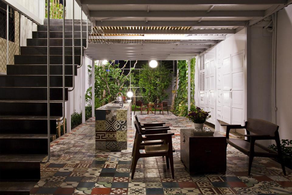This small house in Vietnam has its ground floor living space open to the outdoors. It will eventually be covered by a screen of climbing plants. | www.facebook.com/SmallHouseBliss